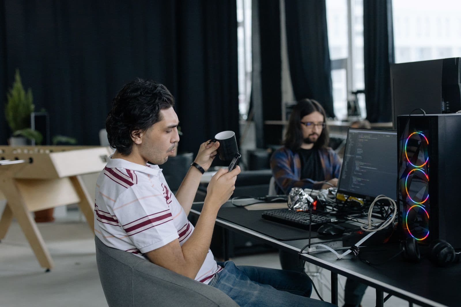 Two people at work in a studio